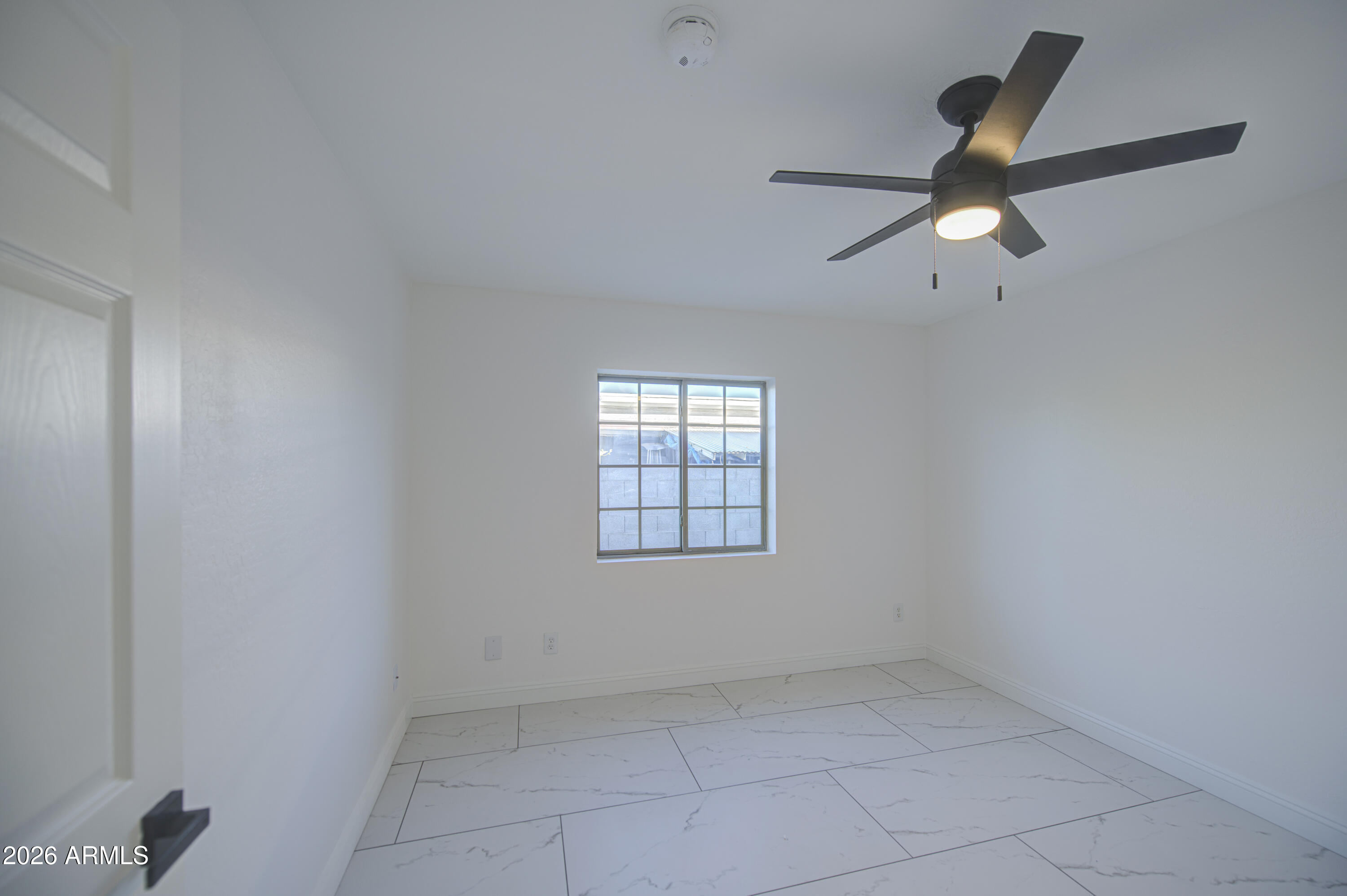 2302 East Alta Vista Road Phoenix, AZ 85042 - Photo 24 of 28 Bedroom 3-pic 1