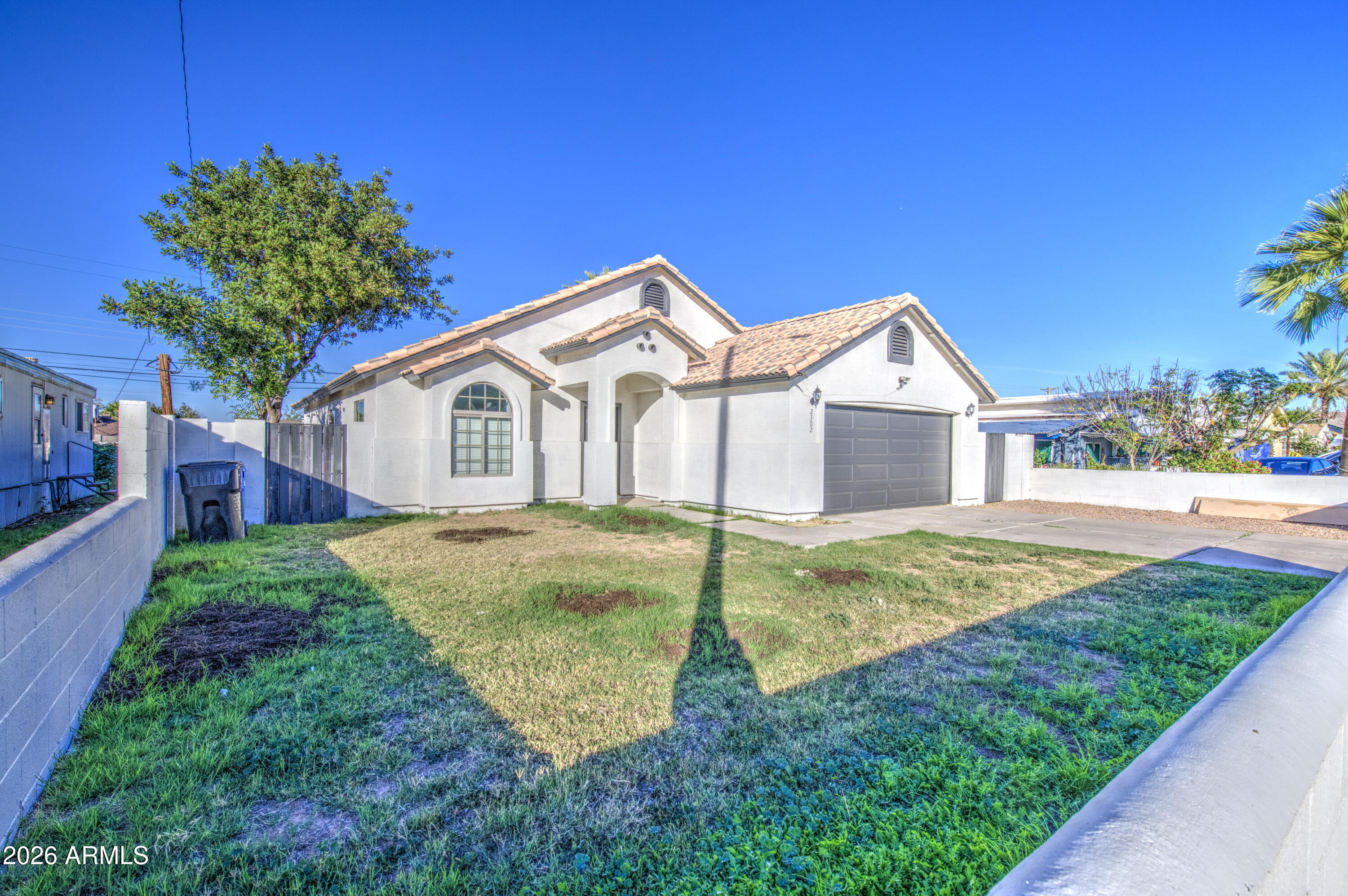2302 East Alta Vista Road Phoenix, AZ 85042 - Photo 3 of 28 Front 3
