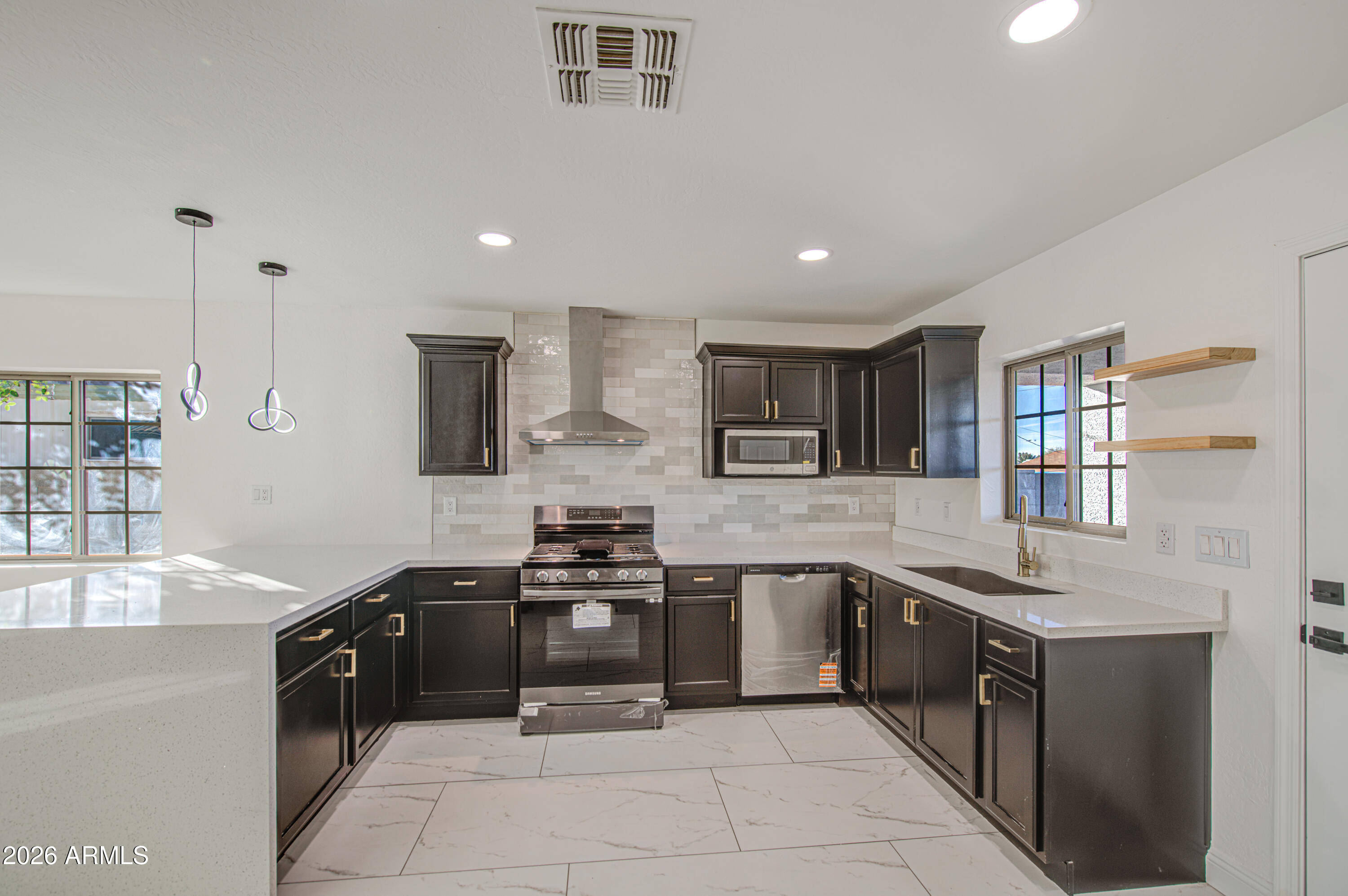 2302 East Alta Vista Road Phoenix, AZ 85042 - Photo 5 of 28 Kitchen 2