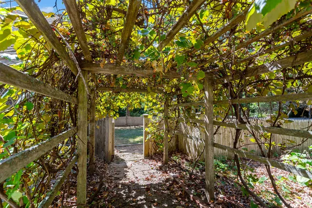 a backyard of a house with lots of green space