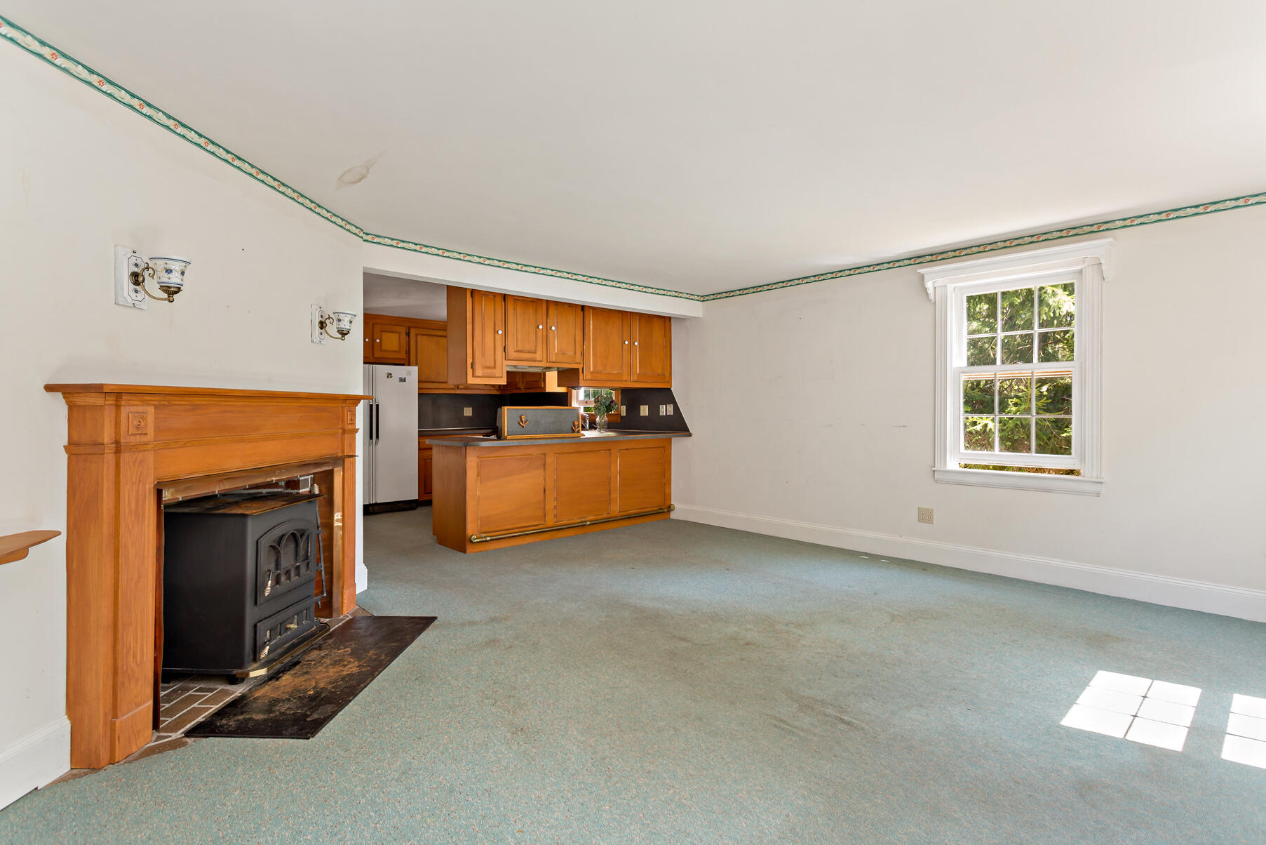 426 Old Post Road Cotuit, MA 02635 - Photo 6 of 27 a view of a livingroom with furniture and a fireplace