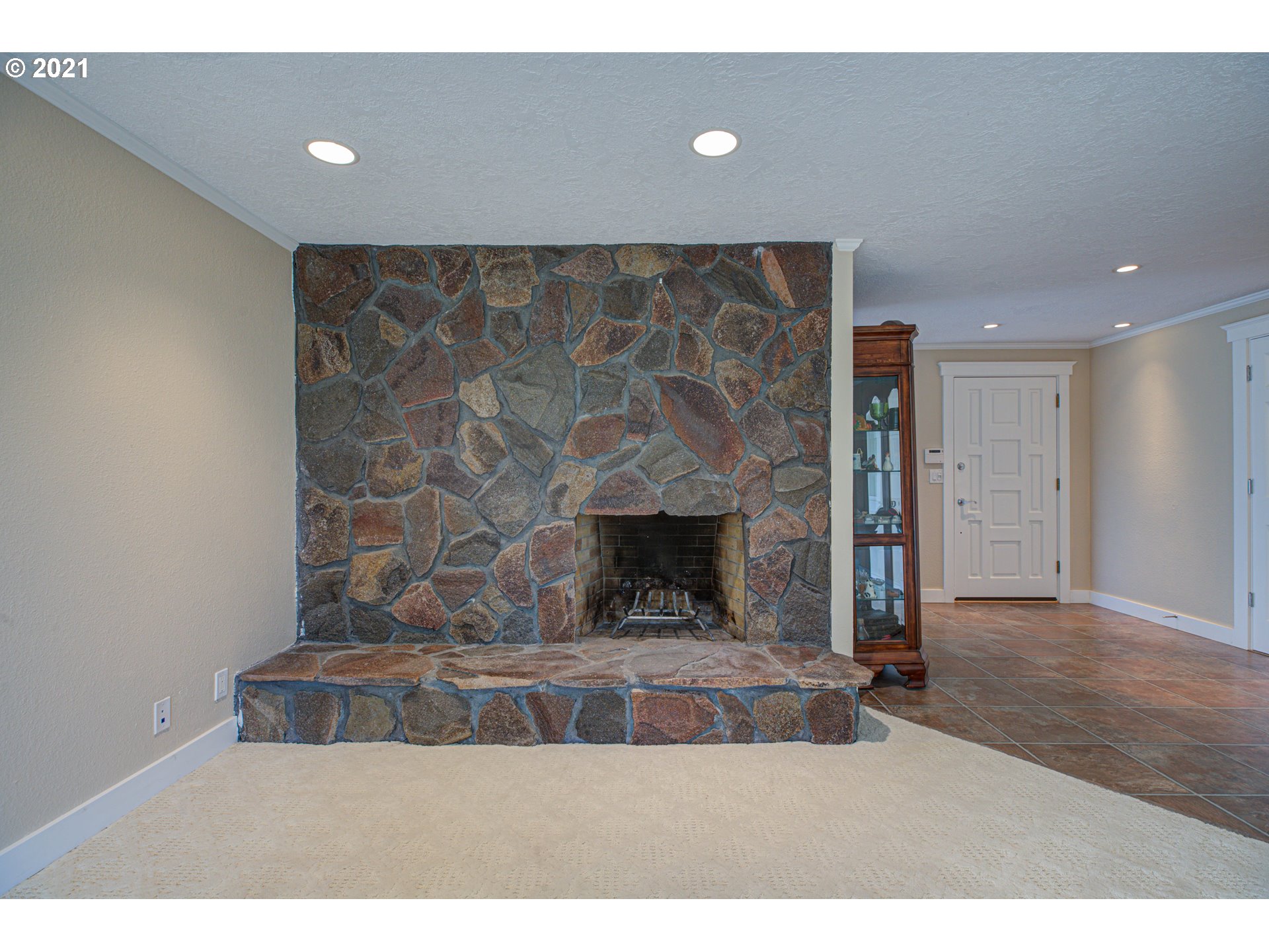 22900 South Haines Road Canby, OR 97013 - Photo 15 of 31 a living room with furniture and a fireplace