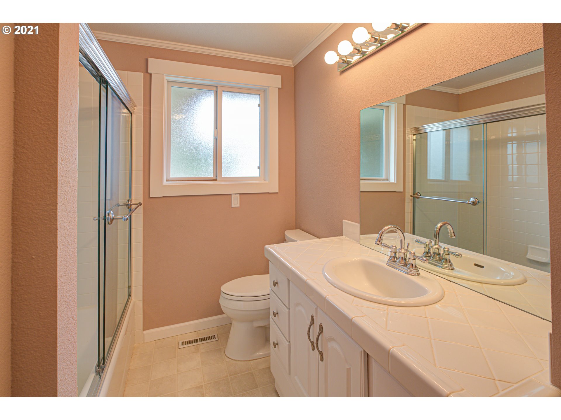 22900 South Haines Road Canby, OR 97013 - Photo 23 of 31 a bathroom with a sink a toilet and mirror