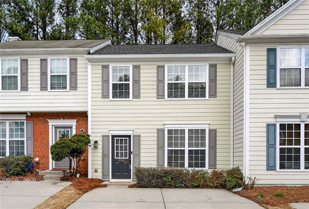 4166 Howell Park Road Duluth, GA 30096 - Photo 1 of 24 a front view of a house