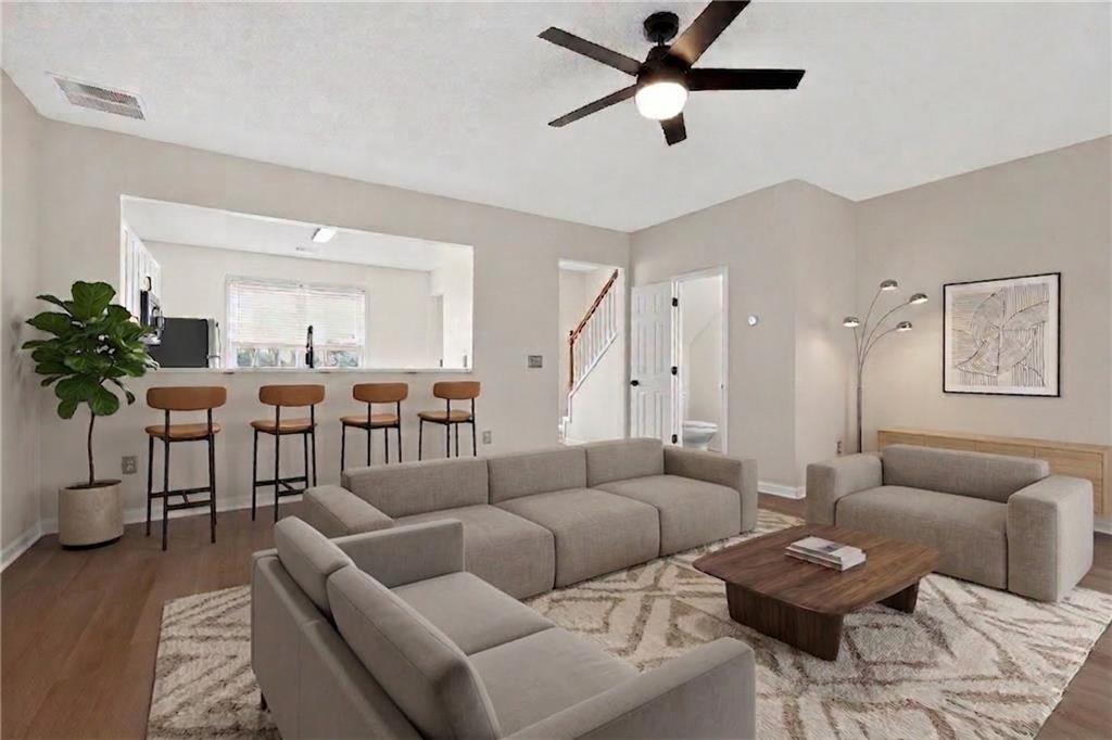 4166 Howell Park Road Duluth, GA 30096 - Photo 19 of 24 a living room with furniture and a large window