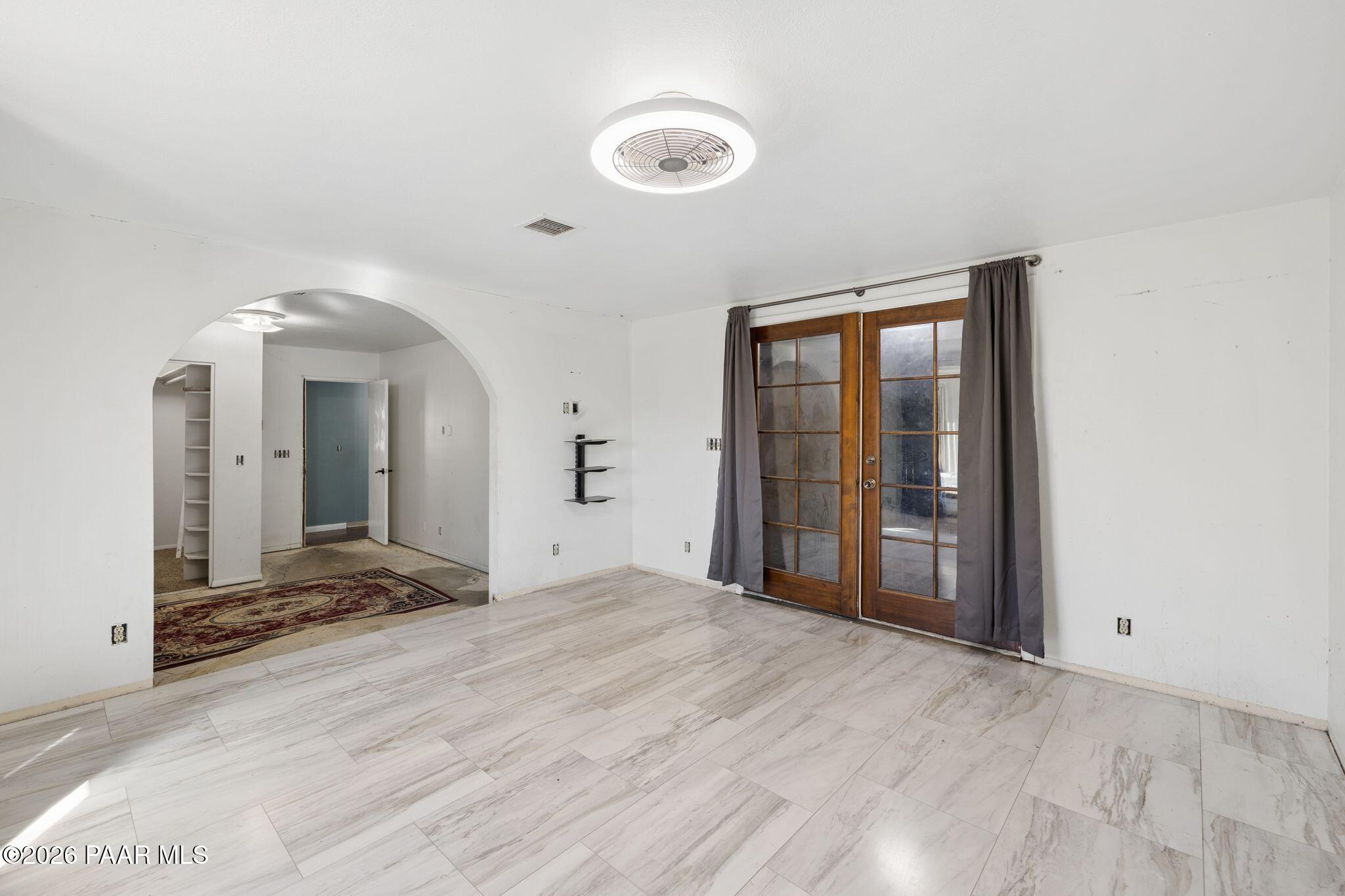 3499 North Tower Road Prescott Valley, AZ 86314 - Photo 23 of 51 Primary__Bedroom & Doors to Storage Room