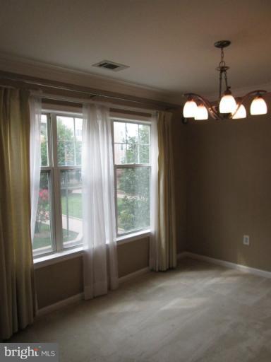 5565 Seminary Road, Unit 213 Falls Church, VA 22041 - Photo 3 of 8 a view of an empty room with a window