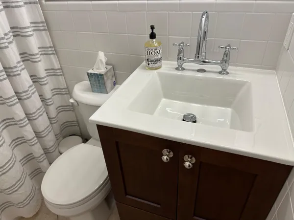 a bathroom with a sink and a toilet
