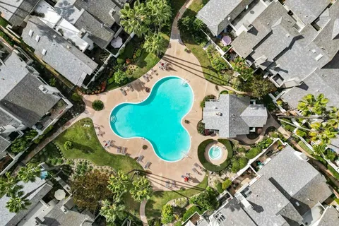 an aerial view of a swimming pool
