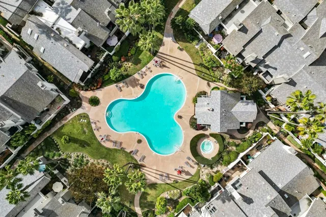 an aerial view of a swimming pool