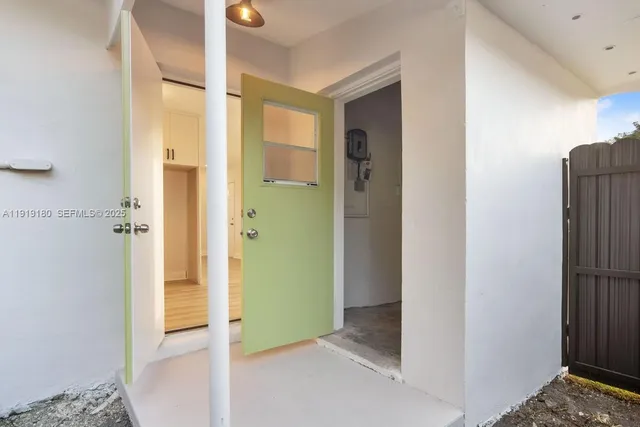 a view of elevator with hallway