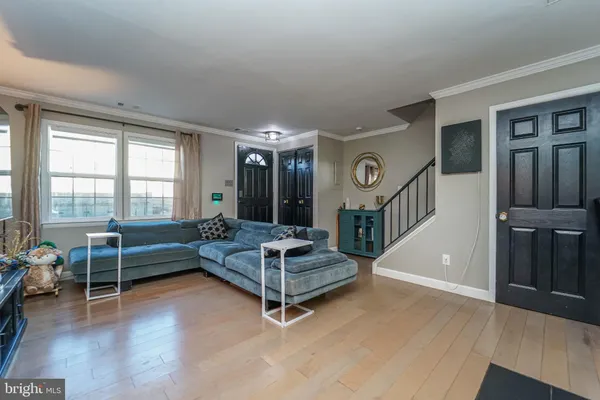 a bedroom with furniture and window