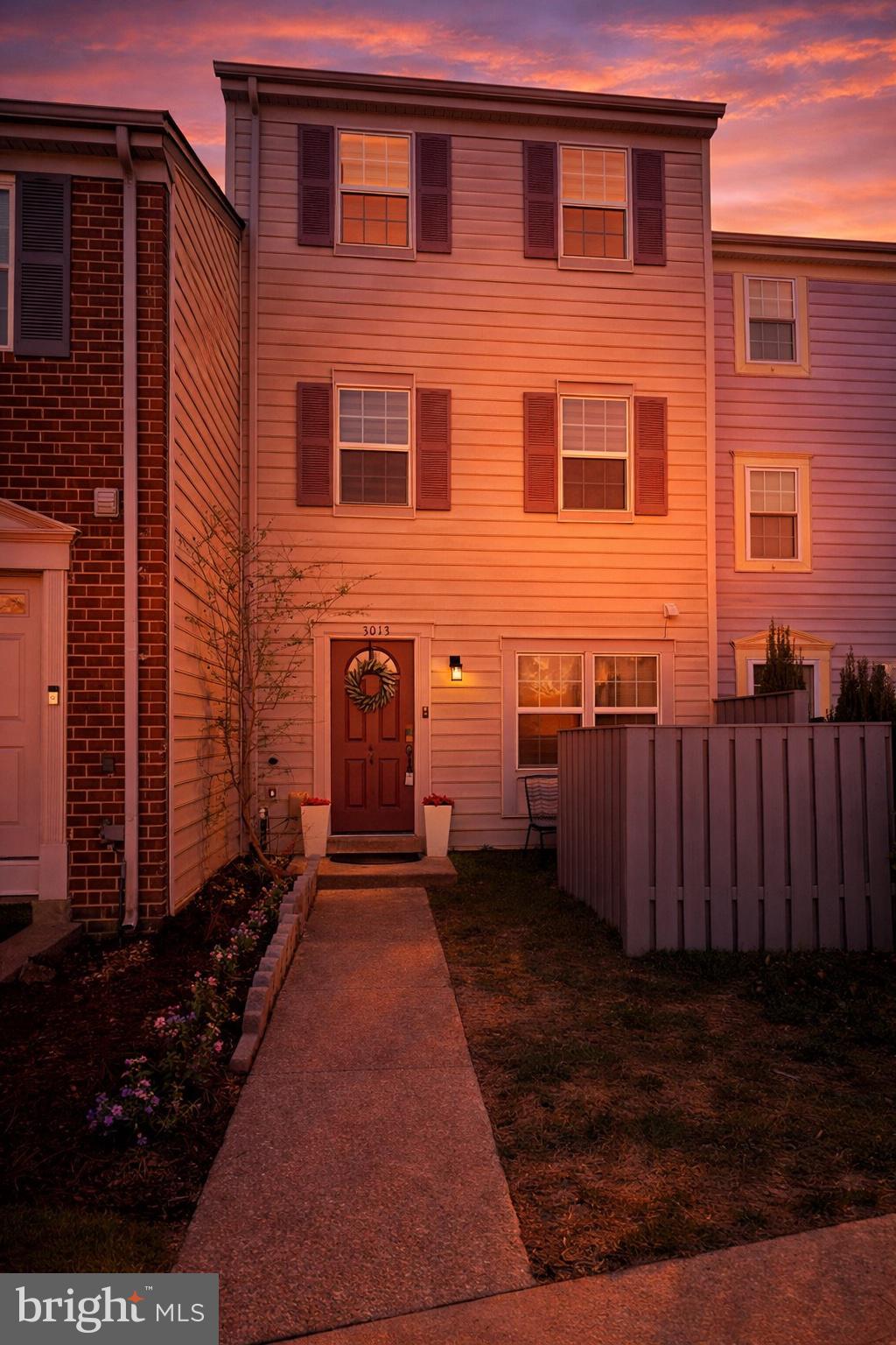 3013 Piano Lane, Unit 34 Silver Spring, MD 20904 - Photo 31 of 40 a front view of a house with a yard