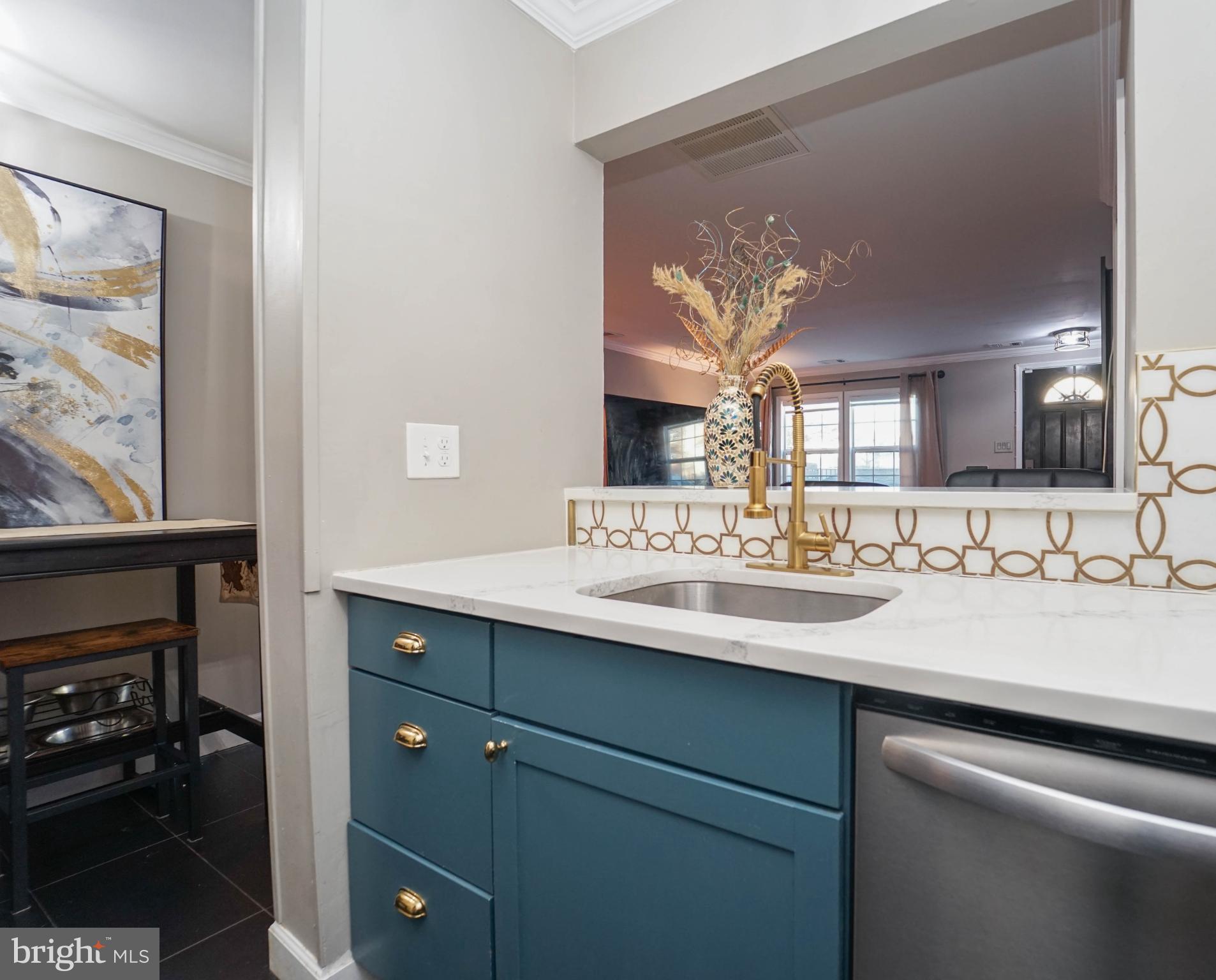 3013 Piano Lane, Unit 34 Silver Spring, MD 20904 - Photo 5 of 40 a bathroom with a sink and a mirror