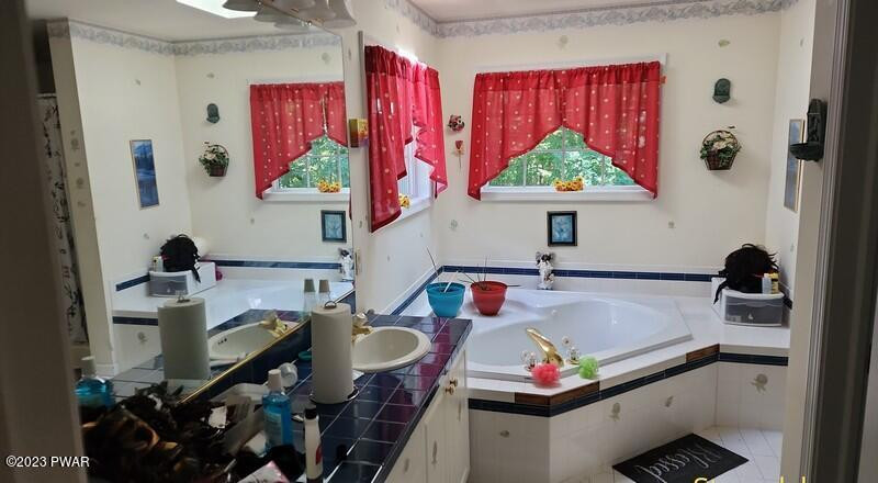 249 Pin Oak Road Stroudsburg, PA 18360 - Photo 20 of 34 a room with furniture and a window