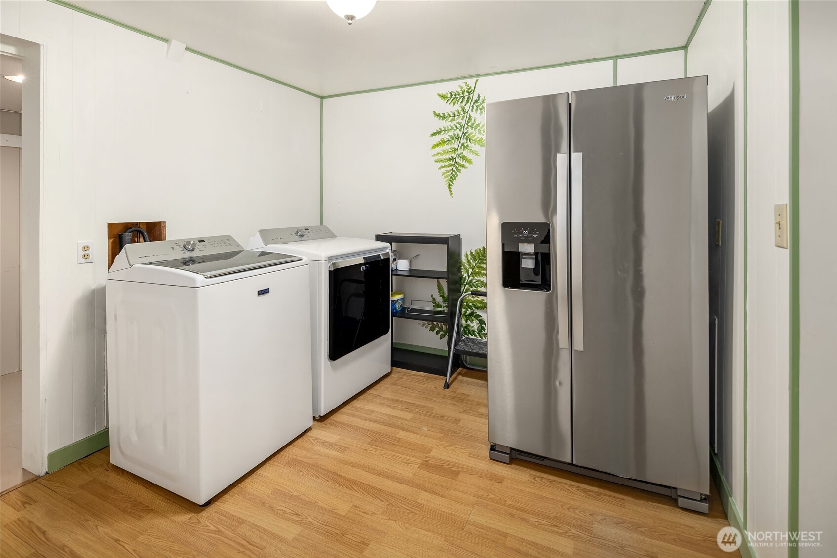 452 11th Street Blaine, WA 98230 - Photo 25 of 33 a kitchen with stainless steel appliances granite countertop a refrigerator and a stove