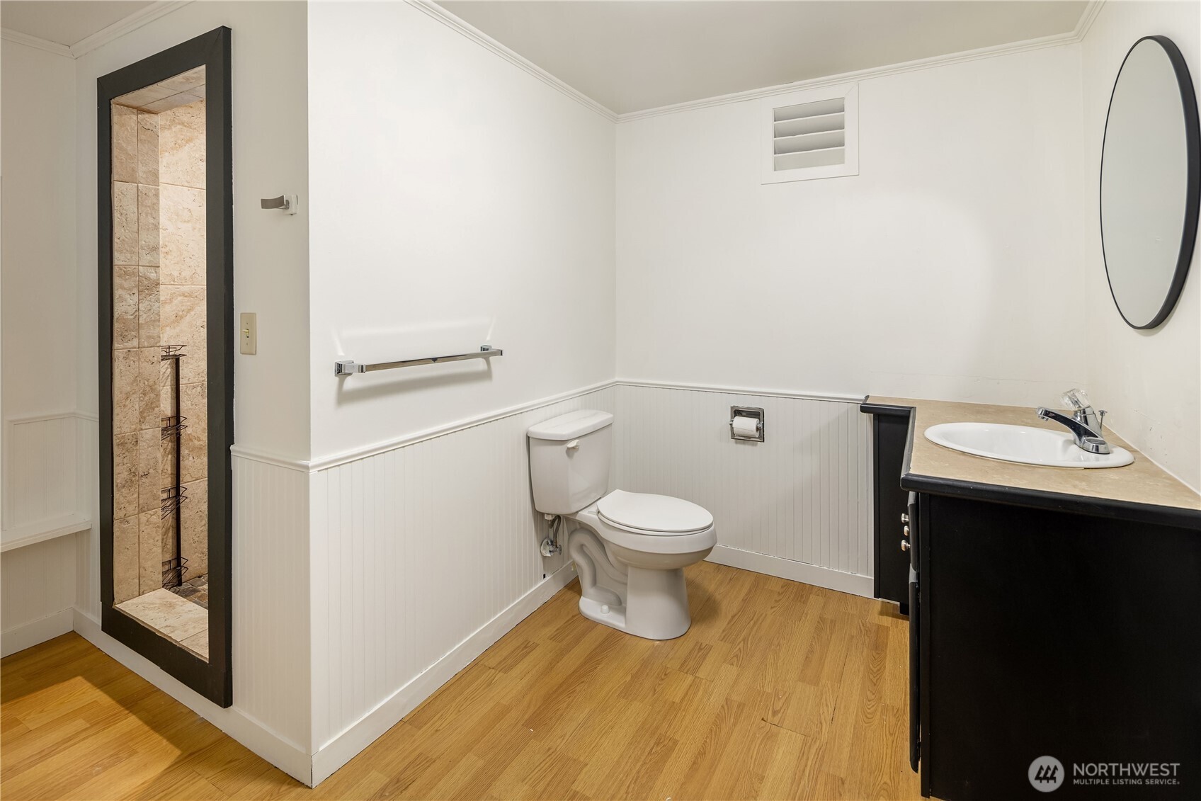 452 11th Street Blaine, WA 98230 - Photo 26 of 33 a white toilet sitting next to a bathroom sink