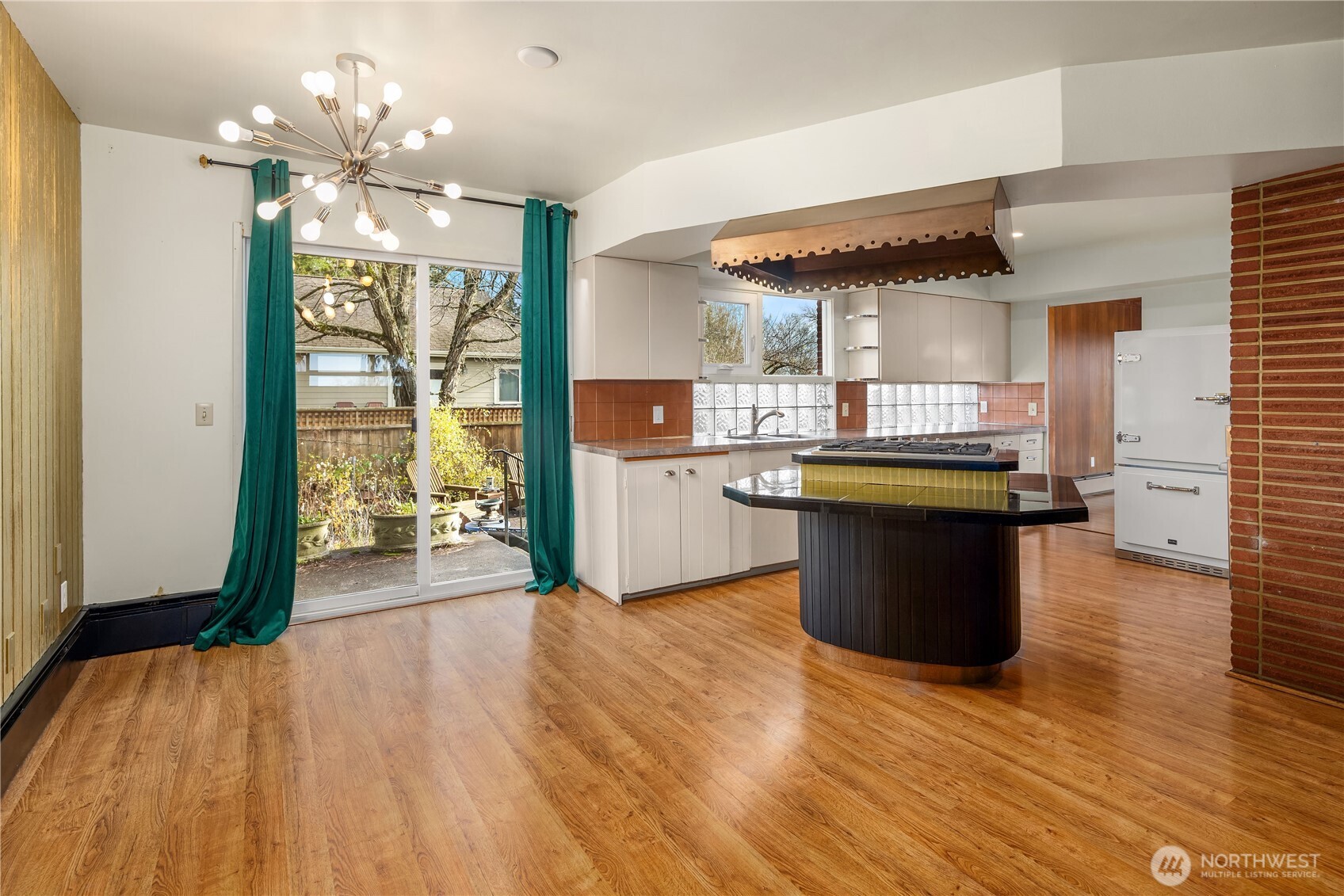 452 11th Street Blaine, WA 98230 - Photo 10 of 33 a view of a kitchen with wooden floor and a window