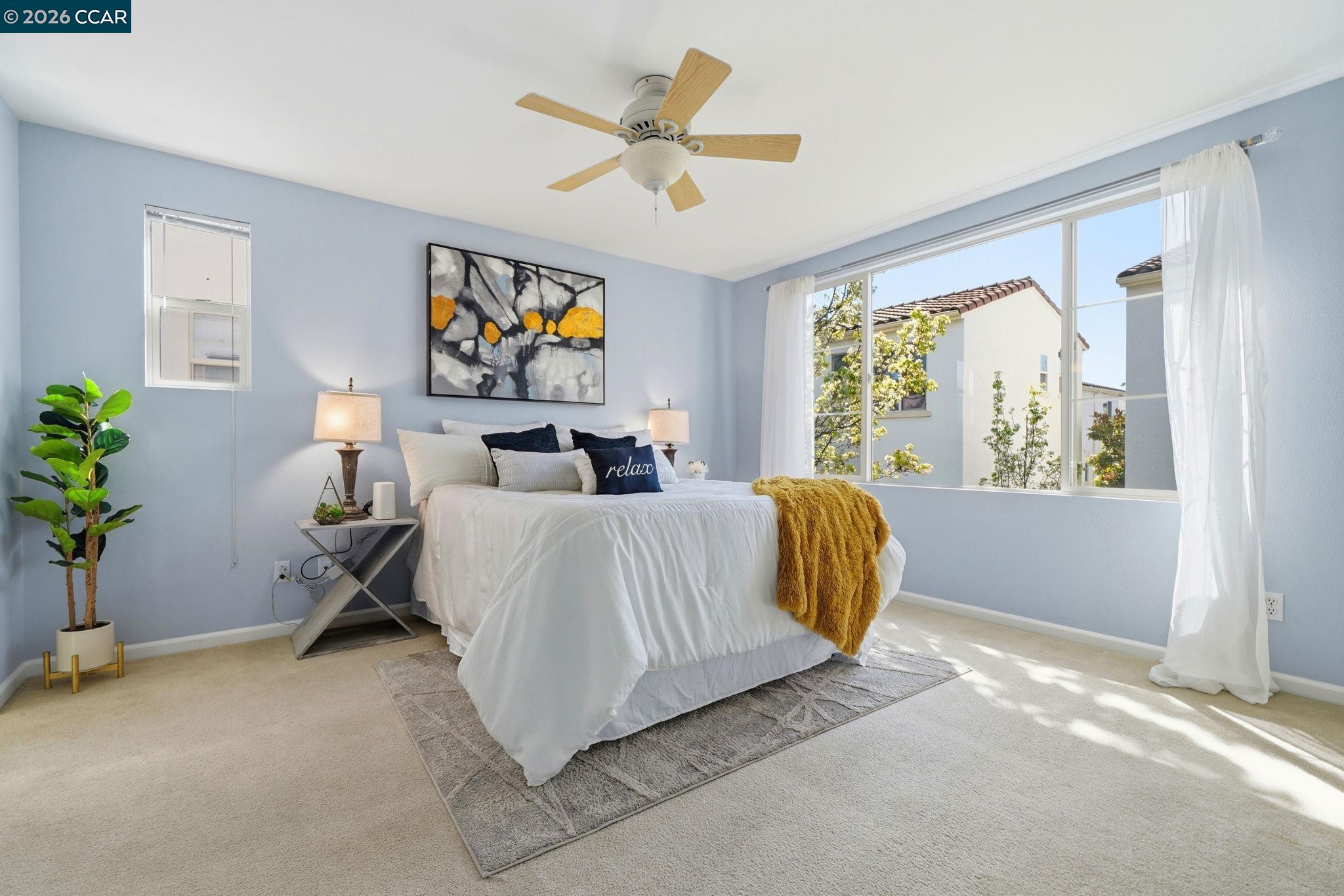 3217 Amaryllis Circle San Ramon, CA 94582 - Photo 19 of 48 a bedroom with a bed and a chair