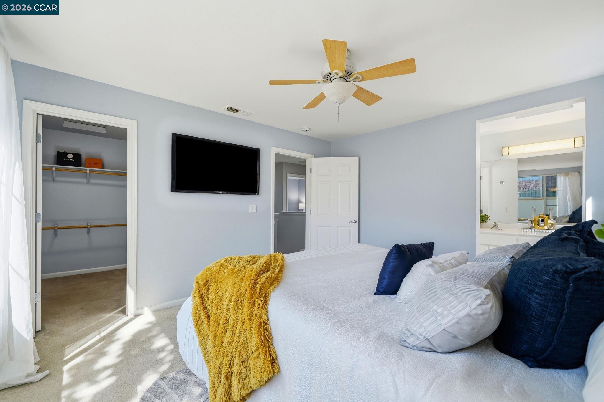 3217 Amaryllis Circle San Ramon, CA 94582 - Photo 20 of 48 a bedroom with a bed and a flat screen tv