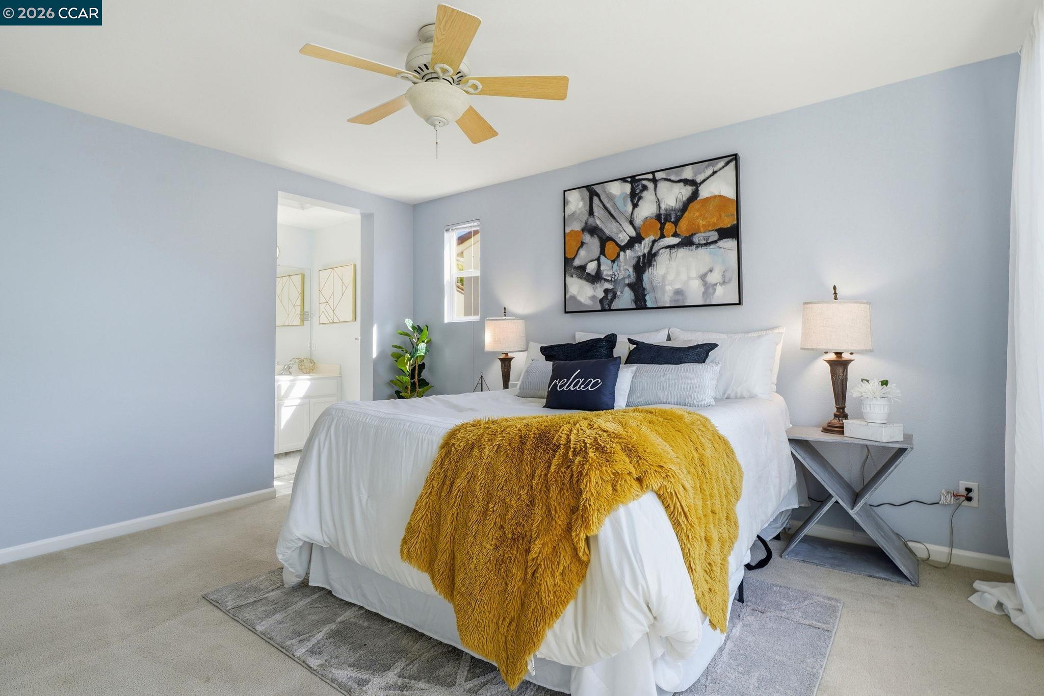 3217 Amaryllis Circle San Ramon, CA 94582 - Photo 21 of 48 a bedroom with a bed and painting on the wall