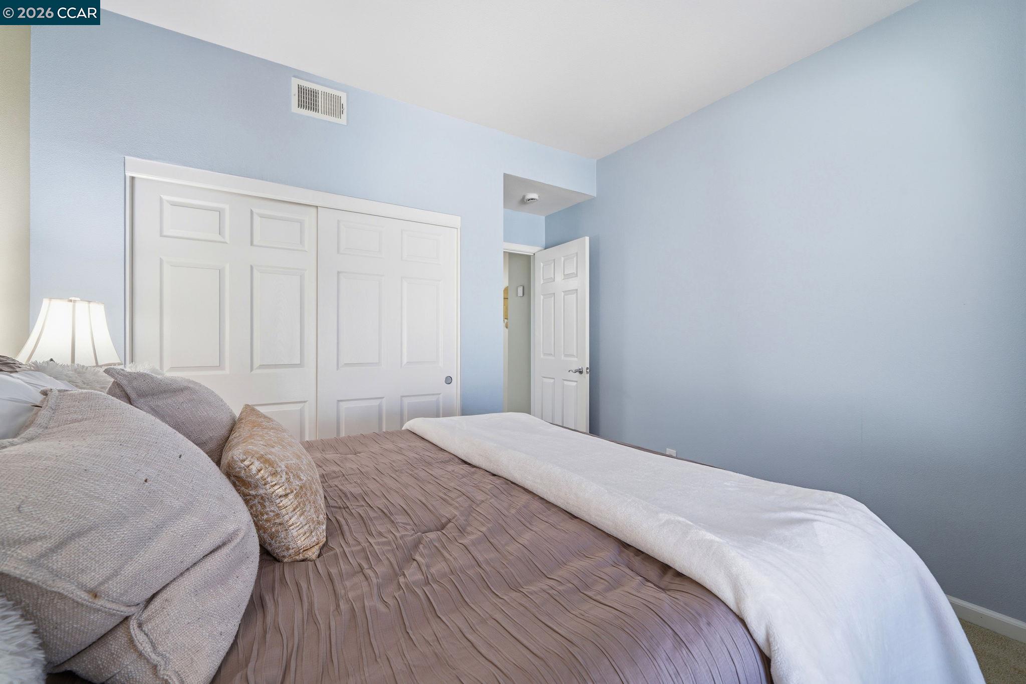 3217 Amaryllis Circle San Ramon, CA 94582 - Photo 28 of 48 a bedroom with a bed and a window