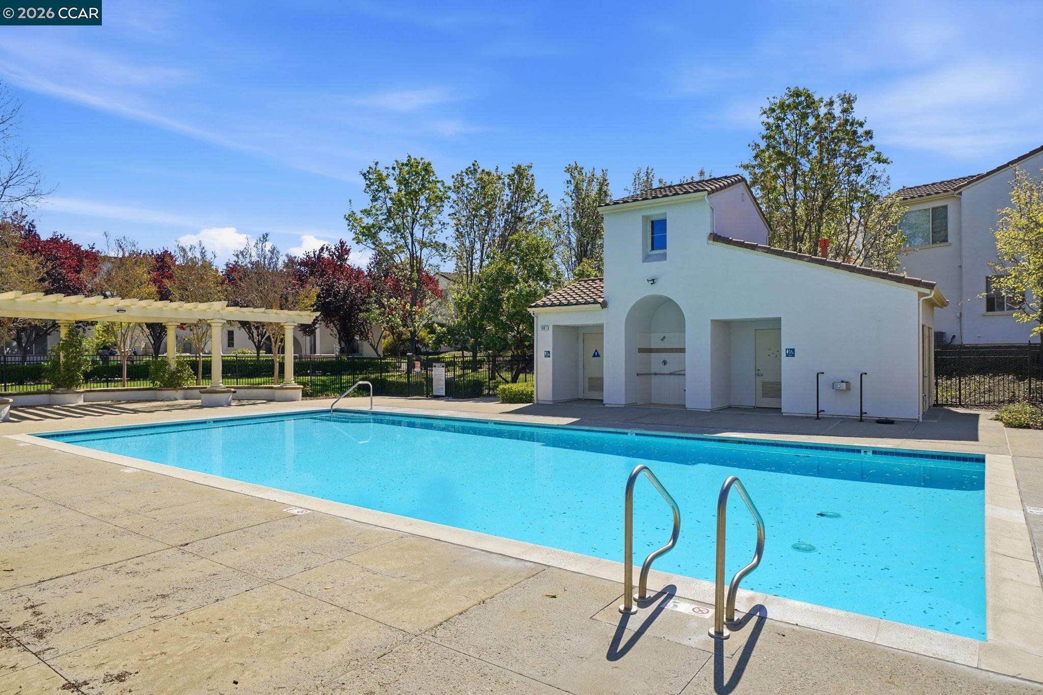 3217 Amaryllis Circle San Ramon, CA 94582 - Photo 45 of 48 a view of a white house with a swimming pool and sitting area