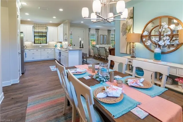 a kitchen with stainless steel appliances granite countertop a stove and a refrigerator