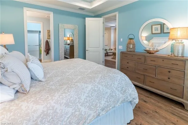 a bathroom with a double vanity sink a mirror and a shower