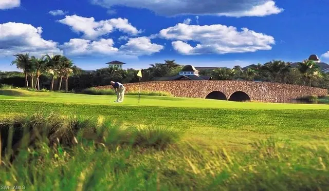 a view of an ocean and a mountain