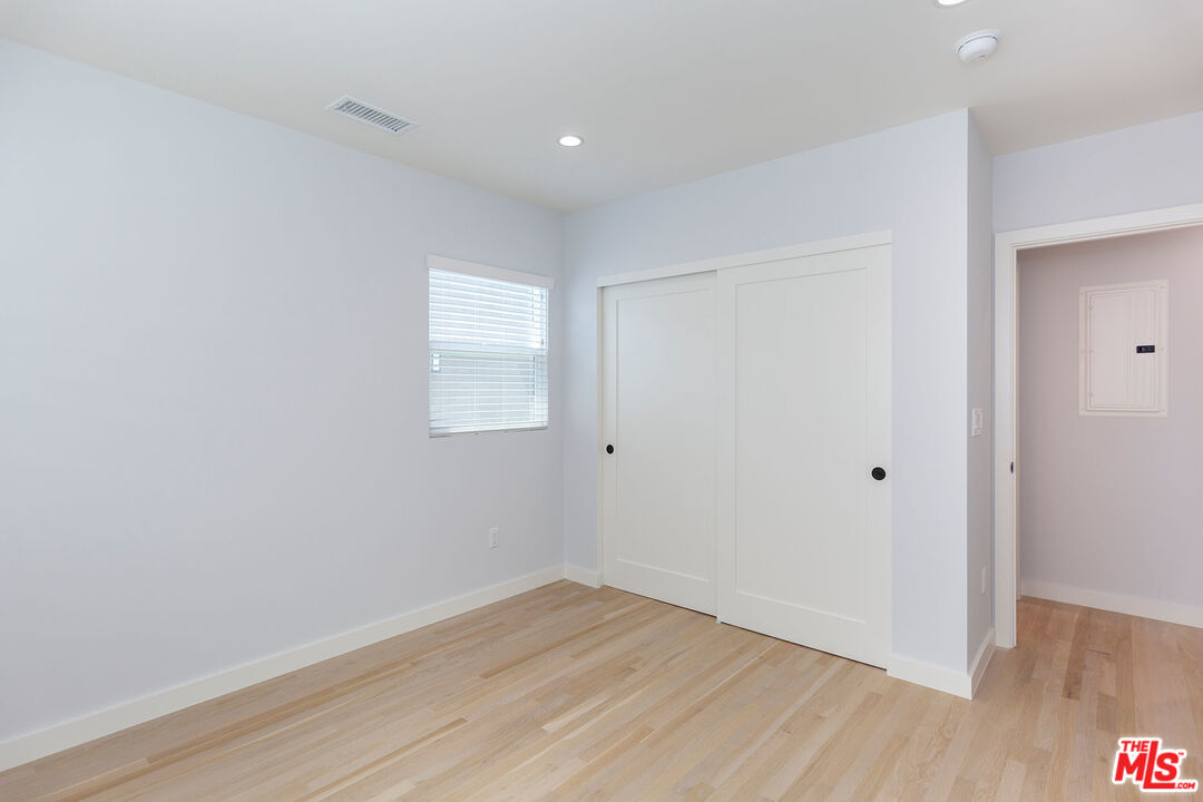 10845 Jefferson Boulevard Culver City, CA 90230 - Photo 25 of 48 a view of an empty room with wooden floor