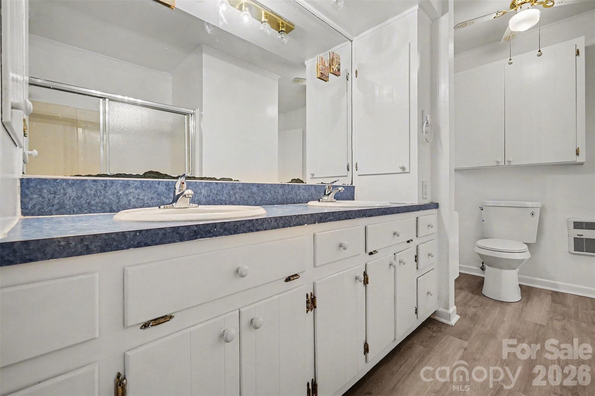 1343 Cedar Pines Lake Road Lancaster, SC 29720 - Photo 11 of 25 a bathroom with a granite countertop sink and a mirror