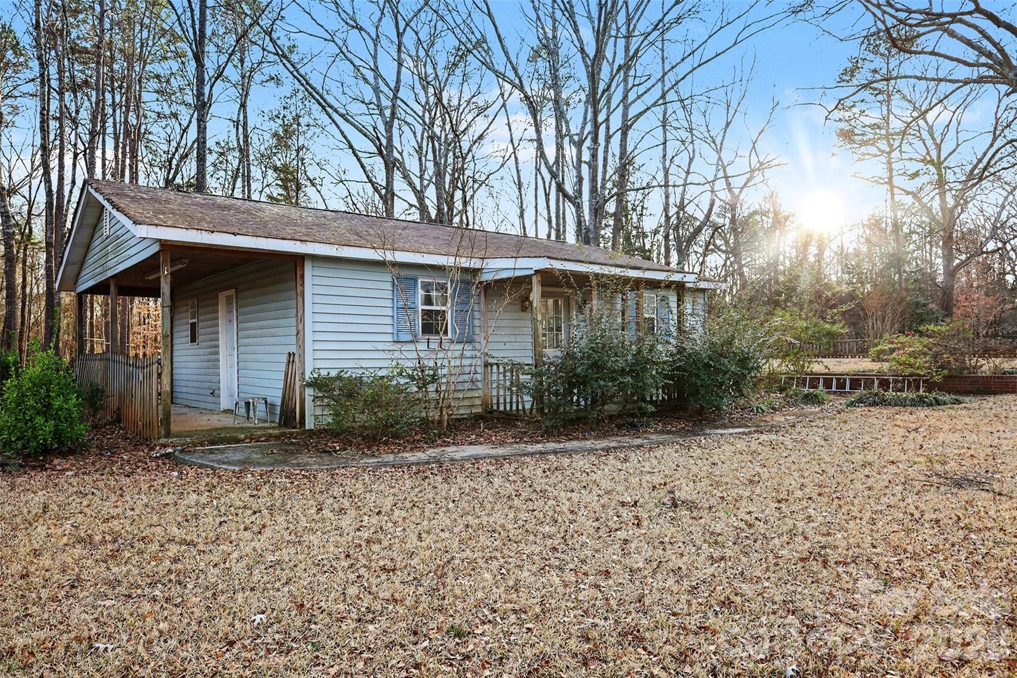 1343 Cedar Pines Lake Road Lancaster, SC 29720 - Photo 17 of 25 a front view of a house with a yard