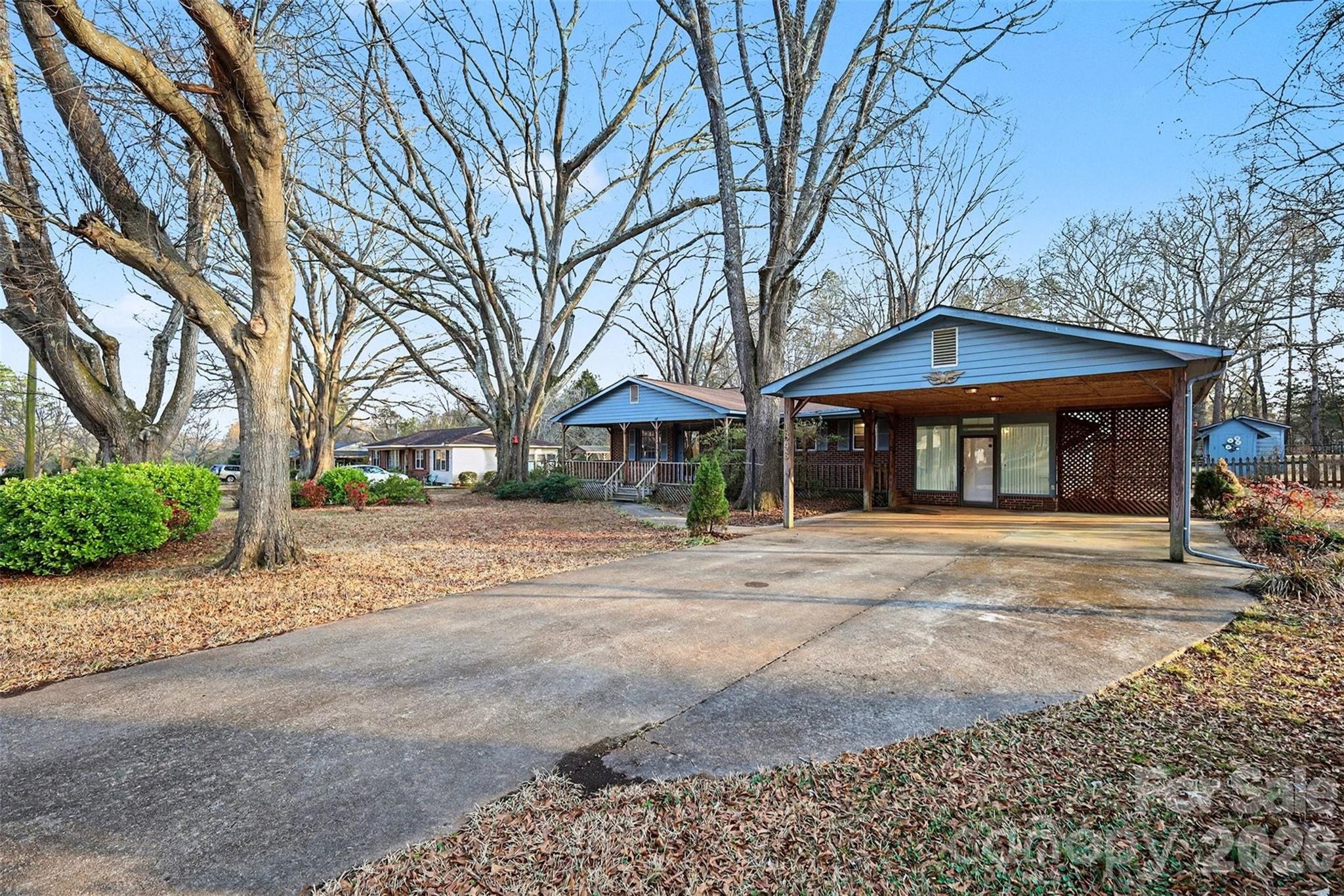 1343 Cedar Pines Lake Road Lancaster, SC 29720 - Photo 2 of 25 a view of a house with a yard and large tree