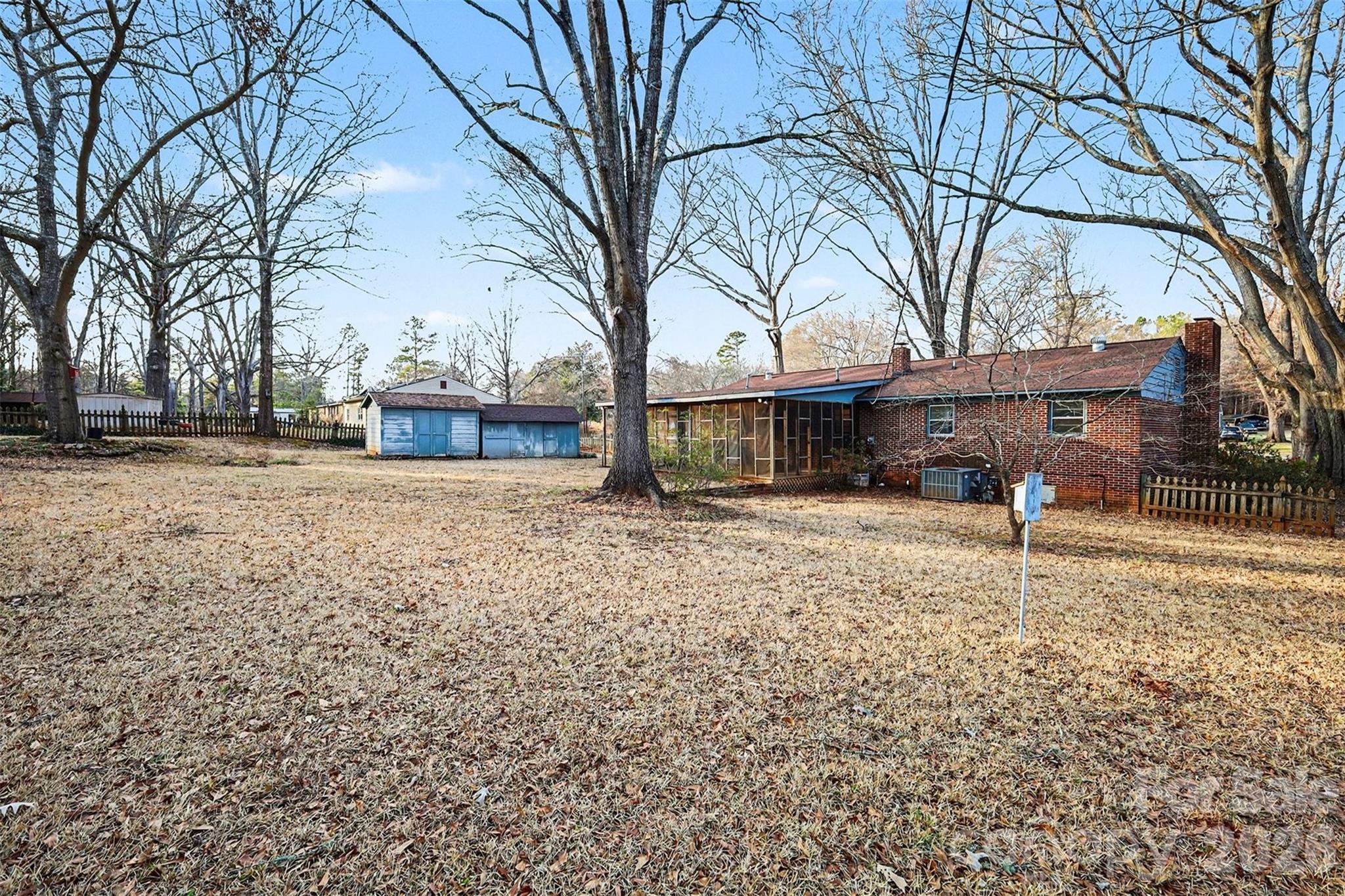 1343 Cedar Pines Lake Road Lancaster, SC 29720 - Photo 21 of 25 a house with trees in front of it