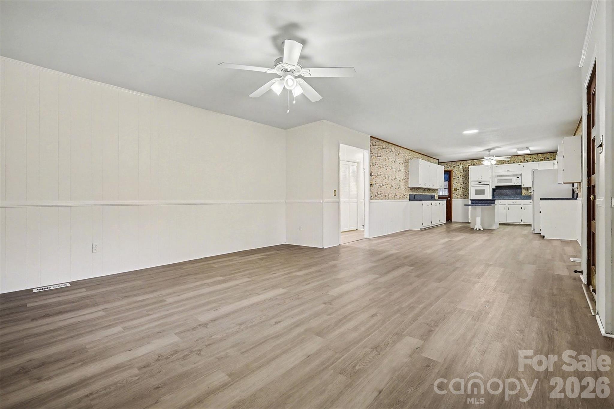 1343 Cedar Pines Lake Road Lancaster, SC 29720 - Photo 5 of 25 a view of empty room with wooden floor