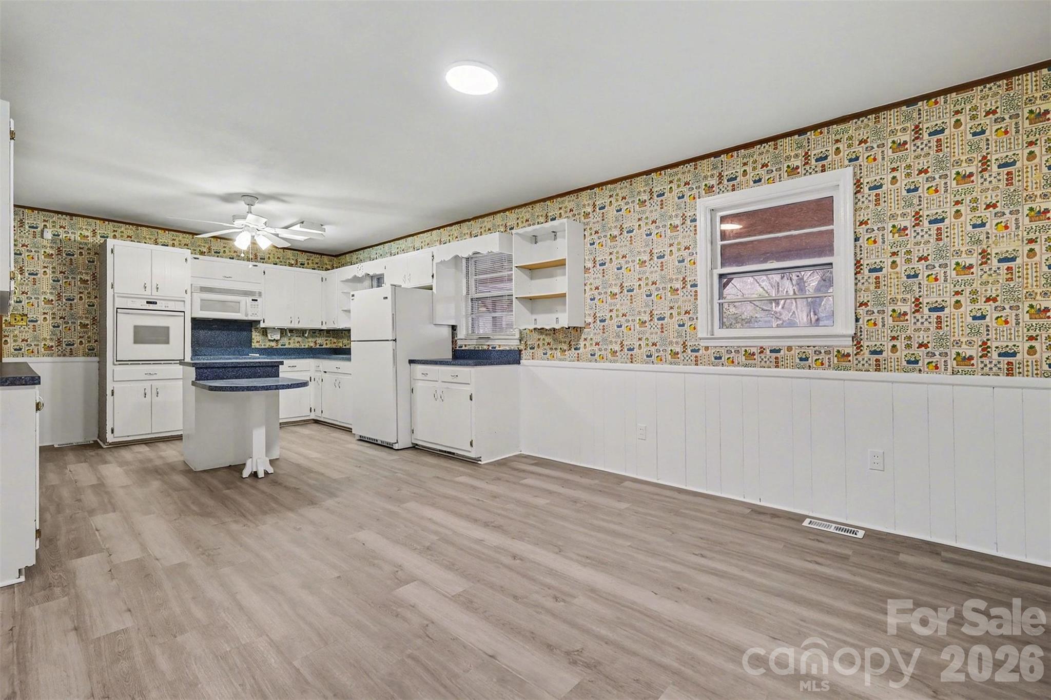 1343 Cedar Pines Lake Road Lancaster, SC 29720 - Photo 6 of 25 a view of kitchen with furniture and wooden floor