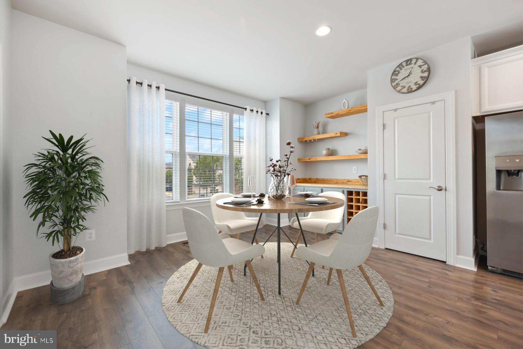 7071 Mongoose Trail Gainesville, VA 20155 - Photo 12 of 51 a workspace with furniture window and wooden floor