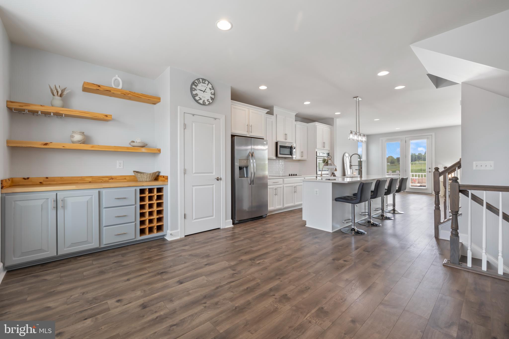 7071 Mongoose Trail Gainesville, VA 20155 - Photo 17 of 51 a view of kitchen with stainless steel appliances refrigerator oven table and chairs