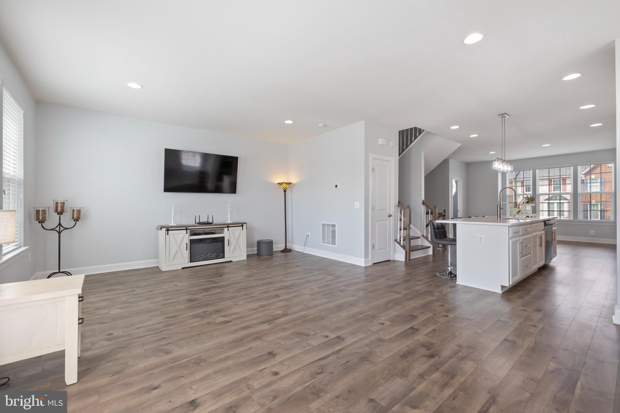 7071 Mongoose Trail Gainesville, VA 20155 - Photo 28 of 51 a view of kitchen with furniture and flat screen tv