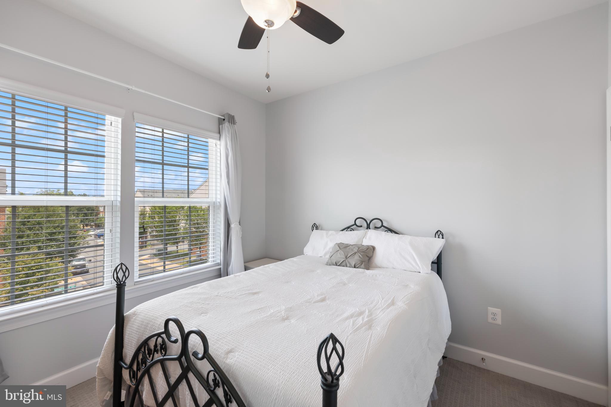 7071 Mongoose Trail Gainesville, VA 20155 - Photo 36 of 51 a bedroom with a bed and a large window