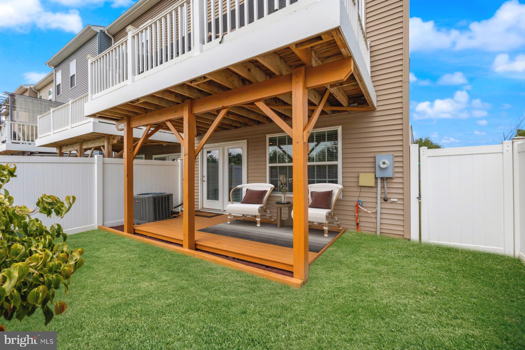 7071 Mongoose Trail Gainesville, VA 20155 - Photo 47 of 51 a view of a house with a yard