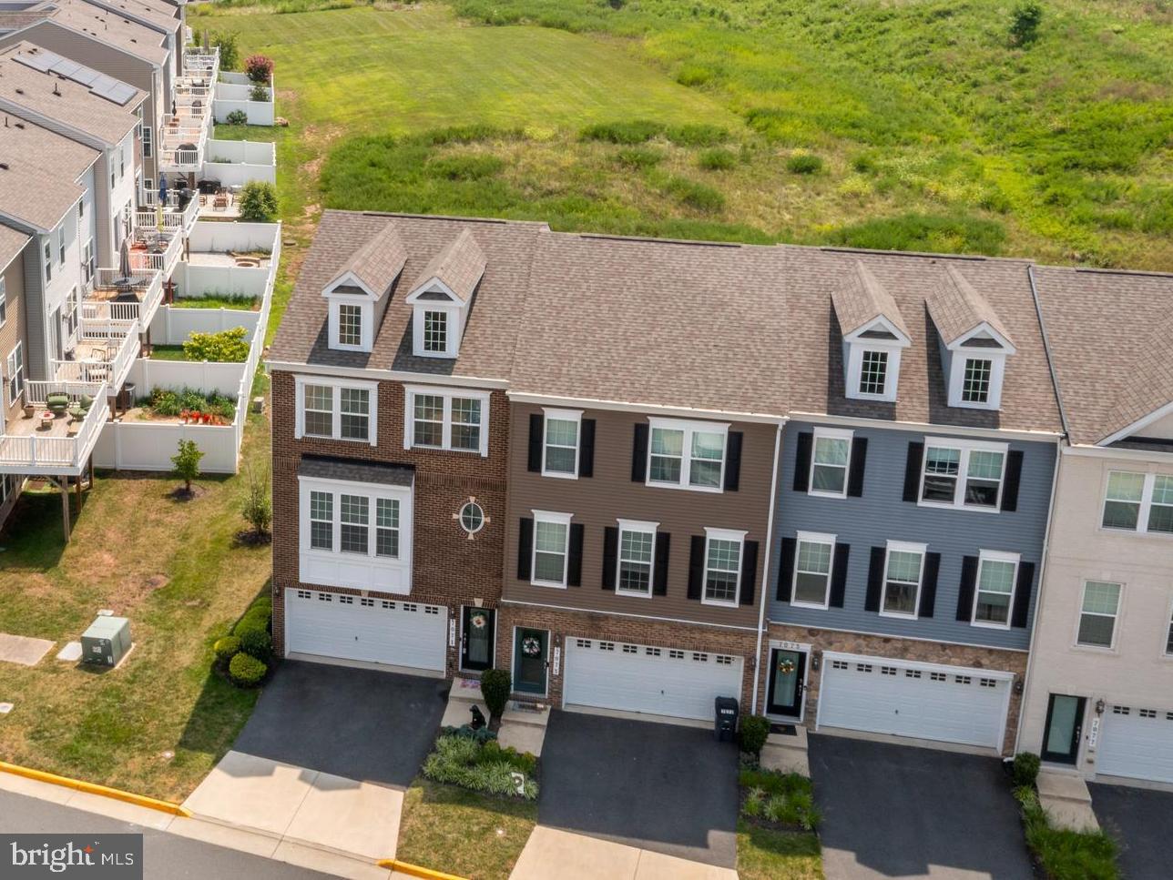 7071 Mongoose Trail Gainesville, VA 20155 - Photo 7 of 51 a view of a city with tall buildings