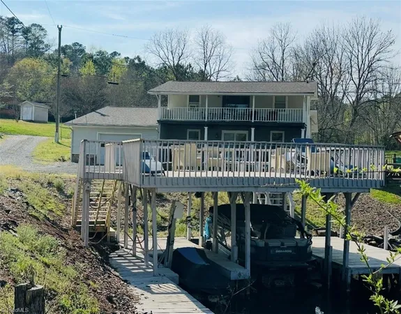 $555,000 | 103 Curran Point Drive, Norwood, NC 28128