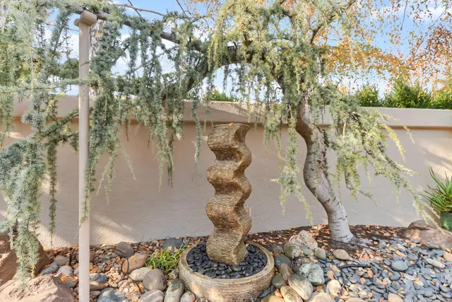 a vase of flowers sitting on a table