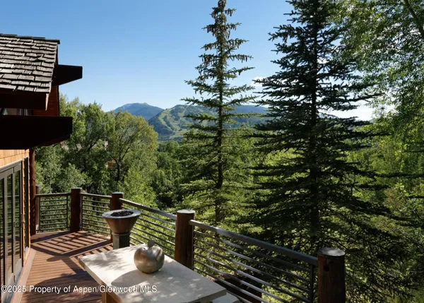 a view of deck with wooden floor and outdoor seating