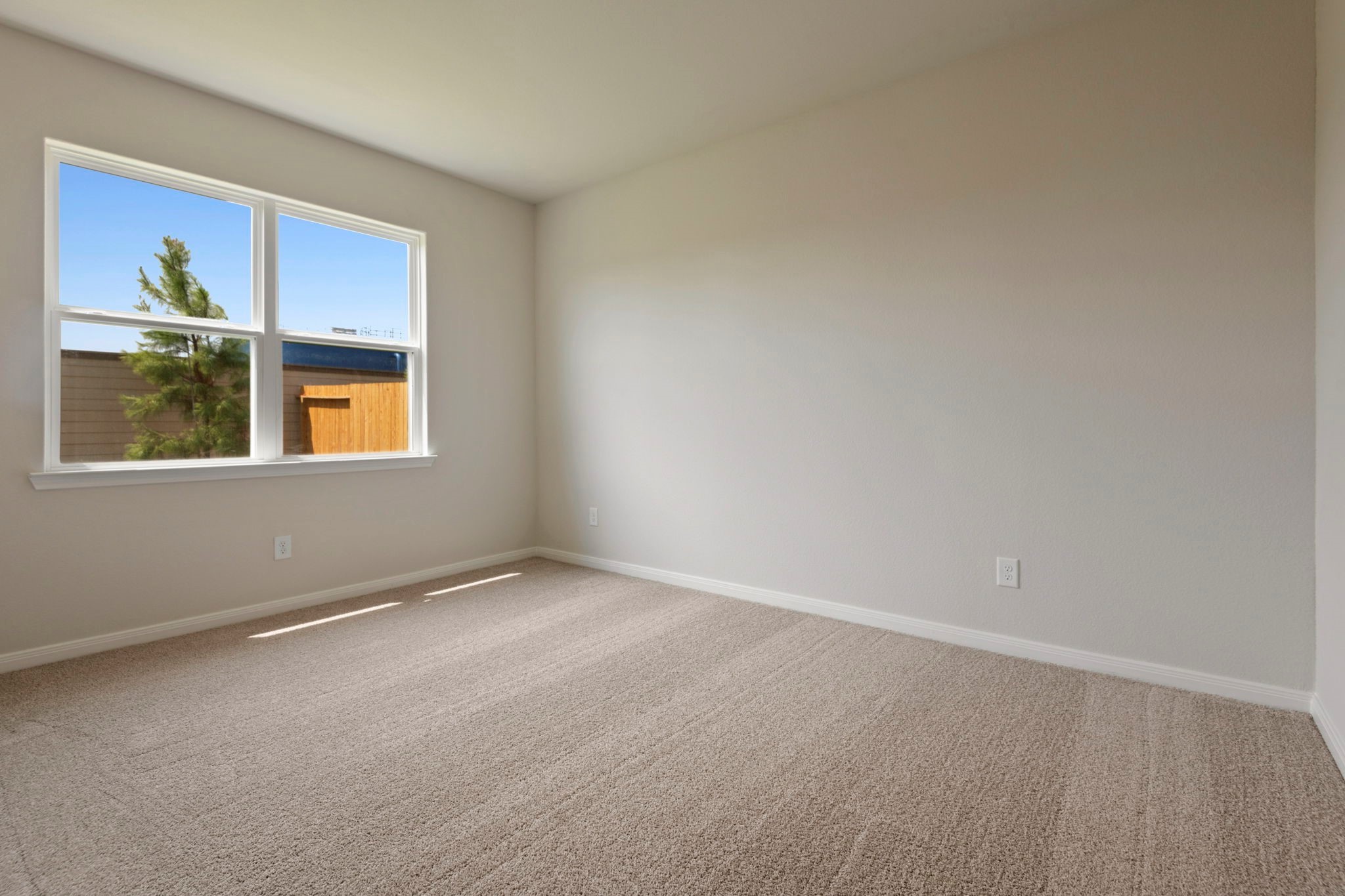 10351 Red Cardinal Drive Cleveland, TX 77328 - Photo 16 of 25 an empty room with a window