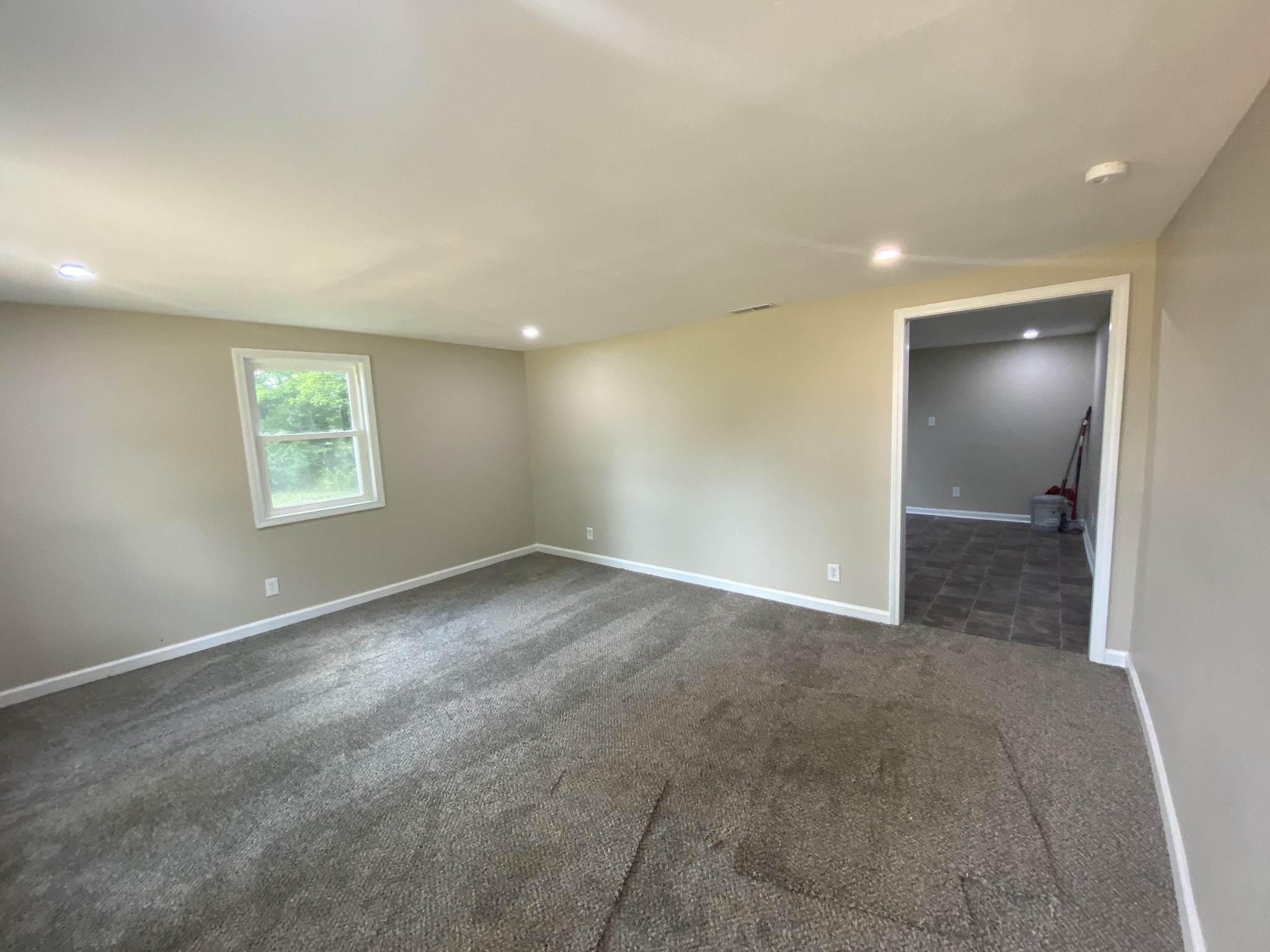 4908 Marion Road Cunningham, TN 37052 - Photo 17 of 27 an empty room with windows and closet