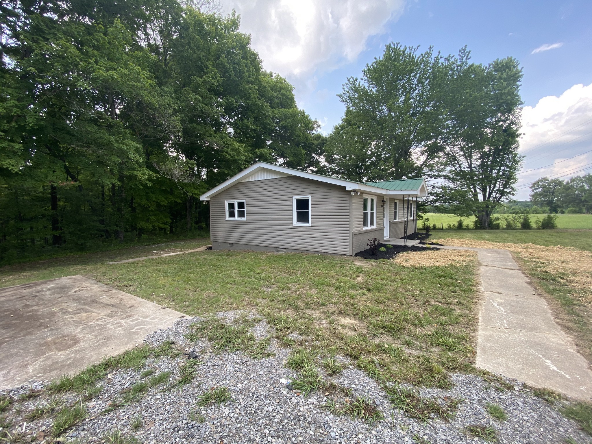 4908 Marion Road Cunningham, TN 37052 - Photo 3 of 27 a view of a house with backyard