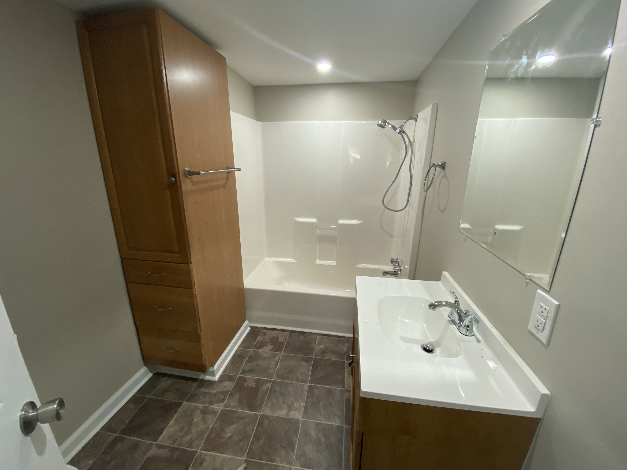 4908 Marion Road Cunningham, TN 37052 - Photo 23 of 27 a bathroom with a sink a toilet and shower